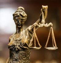 Cosmic and Positive Law